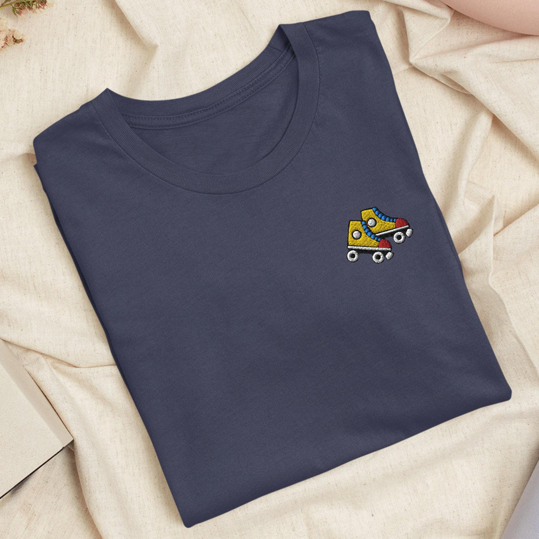a blue t - shirt with a car embroidered on it