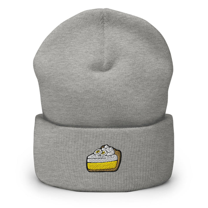 a grey beanie with a cake on it