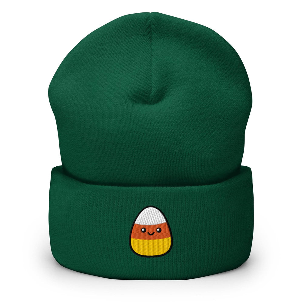 a green beanie with a cartoon face on it