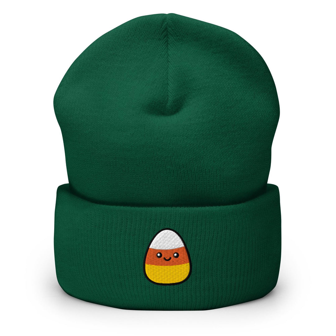 a green beanie with a cartoon face on it