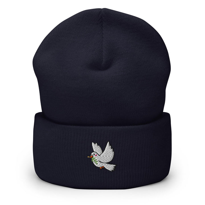 a black beanie with a white bird embroidered on it
