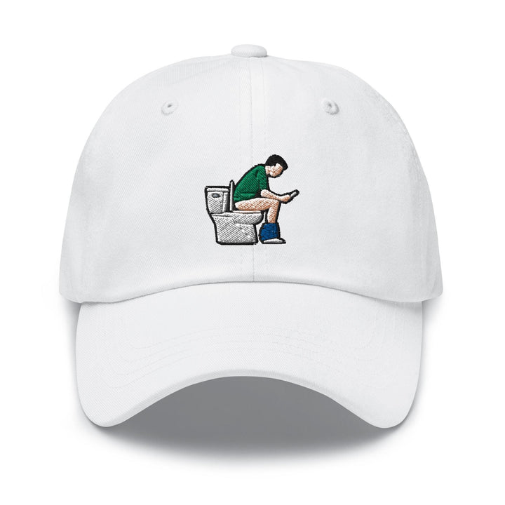 a white hat with a man sitting on a toilet