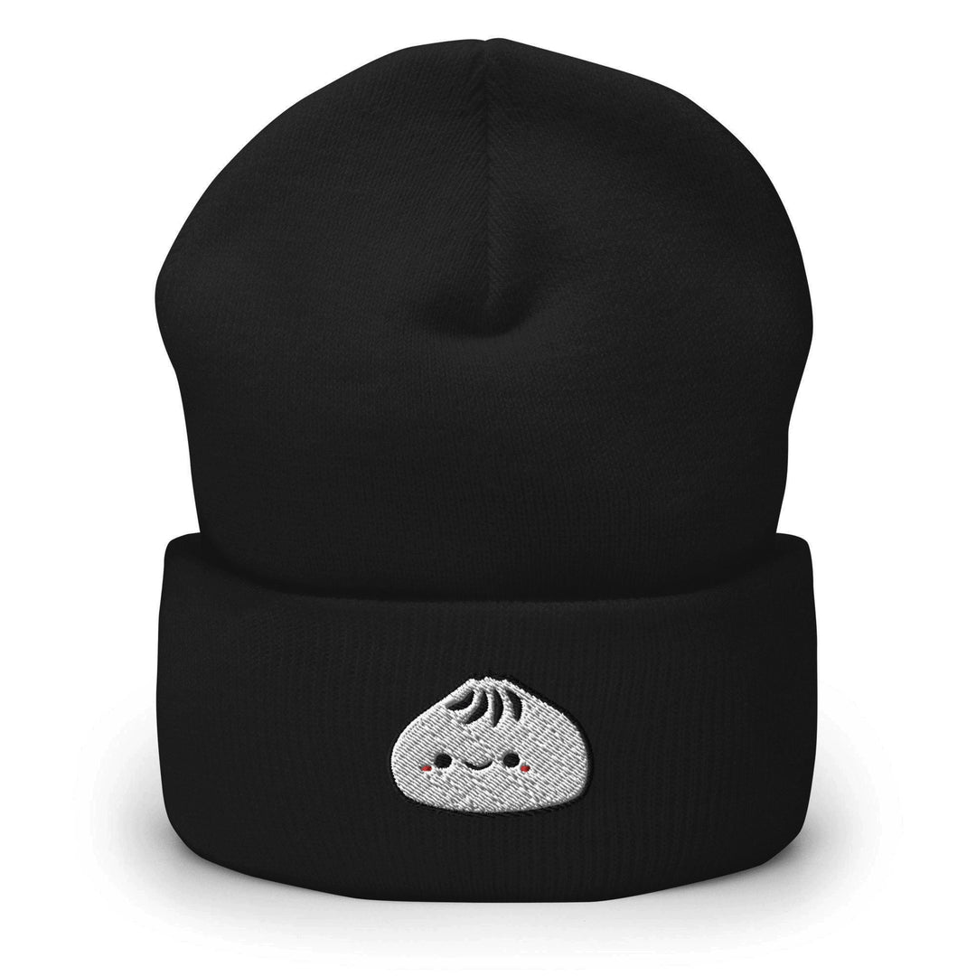 a black beanie with a white face on it