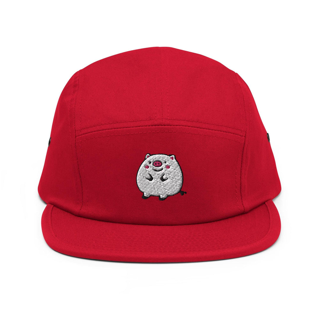 a red hat with a white dog embroidered on it