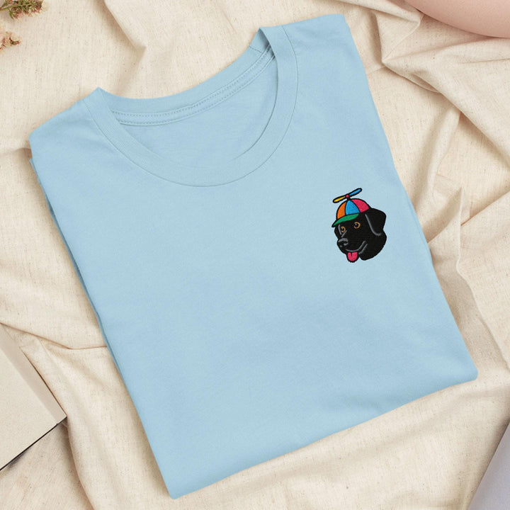 a blue t - shirt with a cartoon character on it