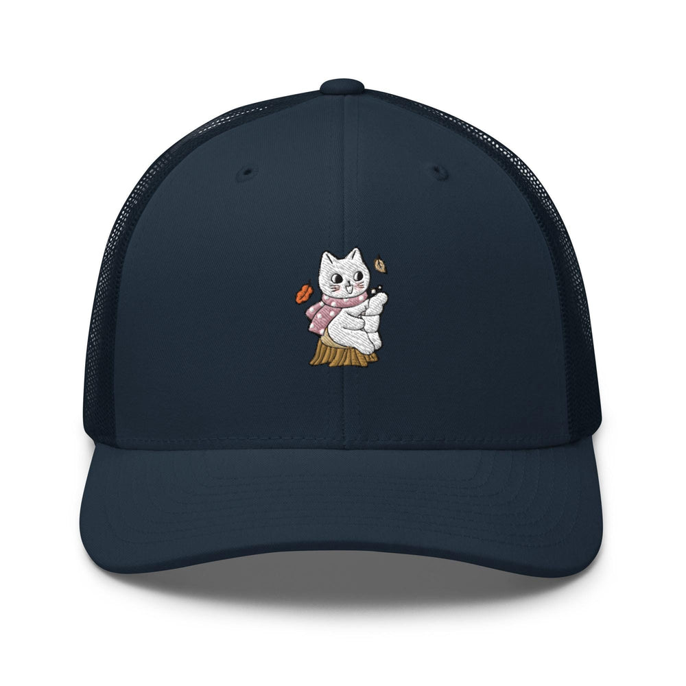 a blue trucker hat with a cartoon cat on it