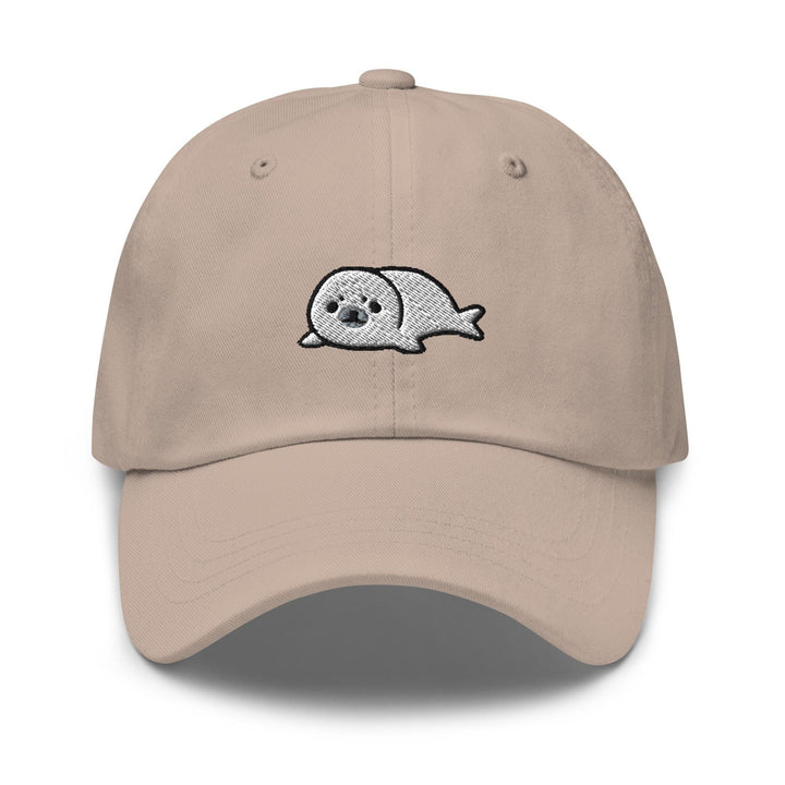 a tan hat with a skull embroidered on it