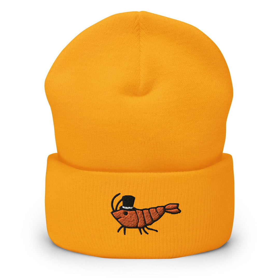 a yellow beanie with a picture of a bug on it