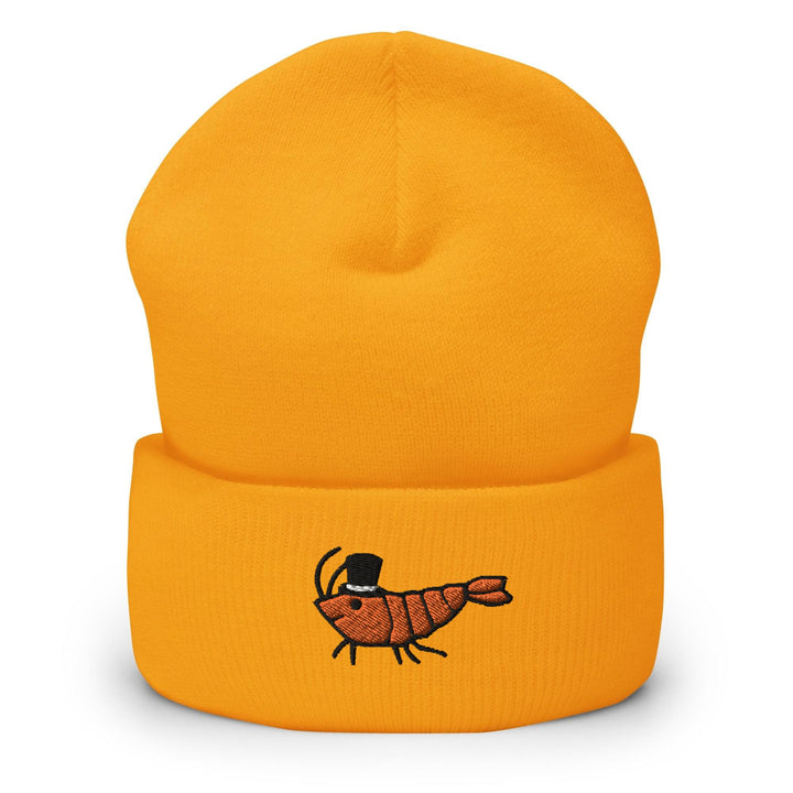 a yellow beanie with a picture of a bug on it