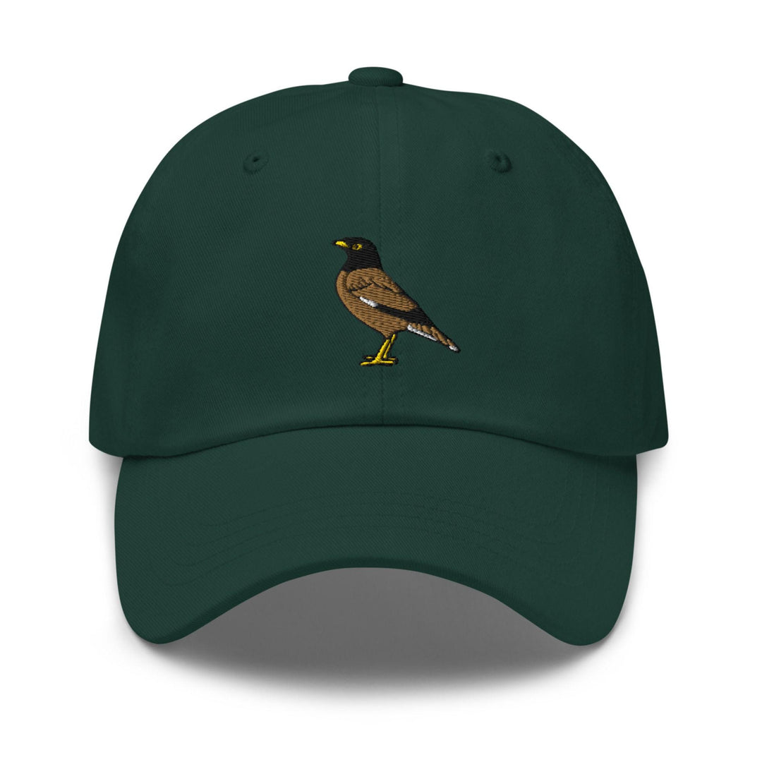 a green hat with a bird embroidered on it