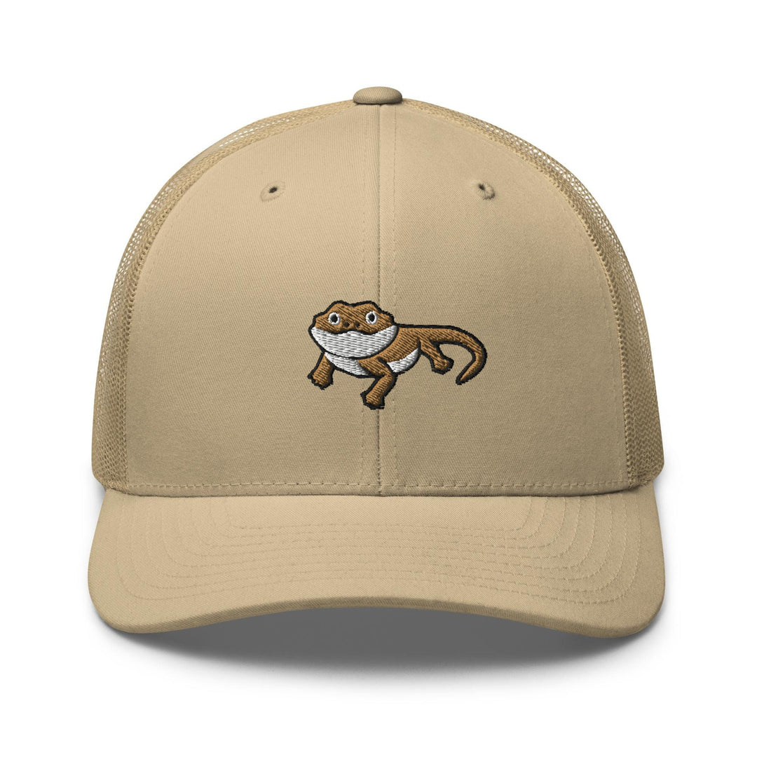 a tan trucker hat with an image of a monkey on it