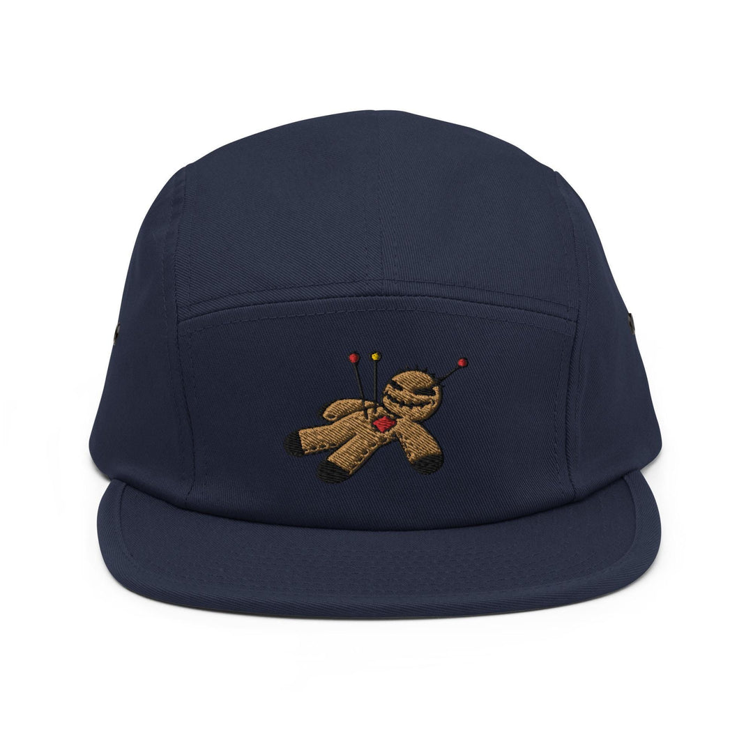 a blue hat with a teddy bear embroidered on it