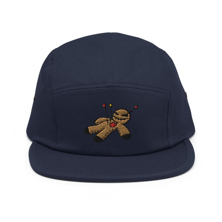 a blue hat with a teddy bear embroidered on it