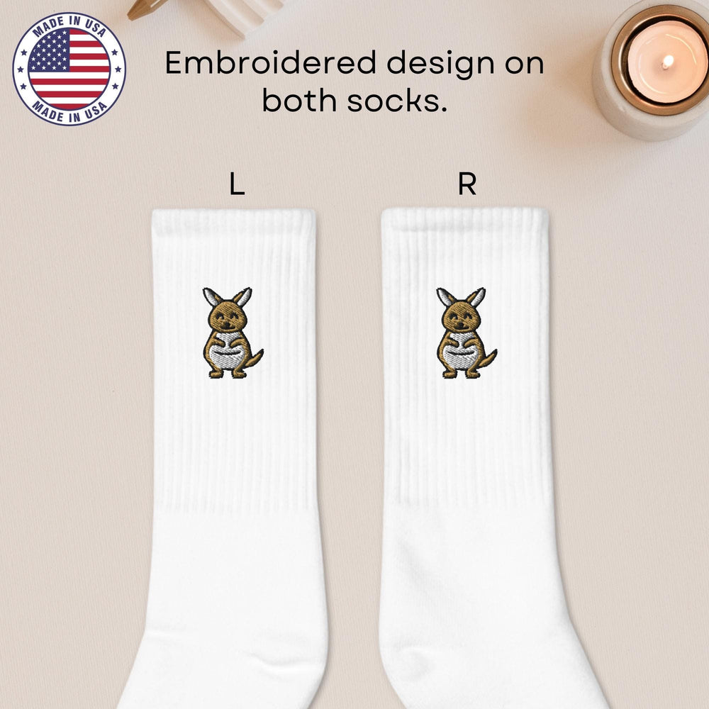 a pair of socks with a picture of a rabbit on them