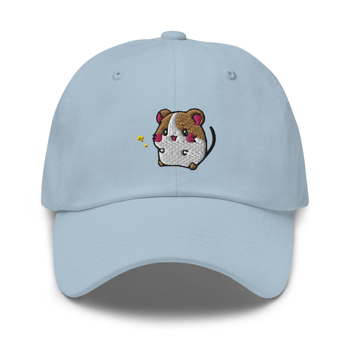 a light blue hat with a cartoon dog on it