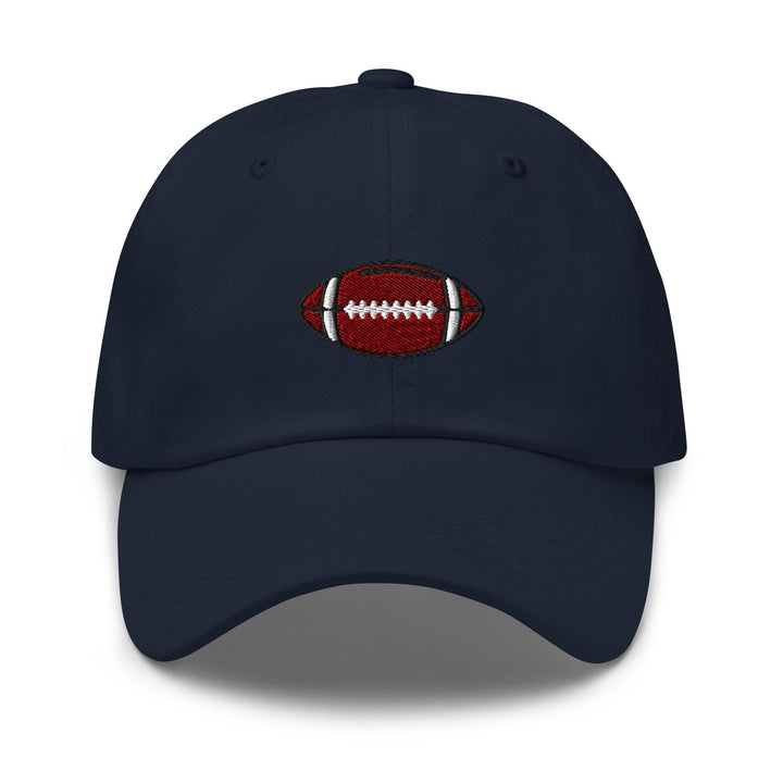 a baseball cap with a football embroidered on the front