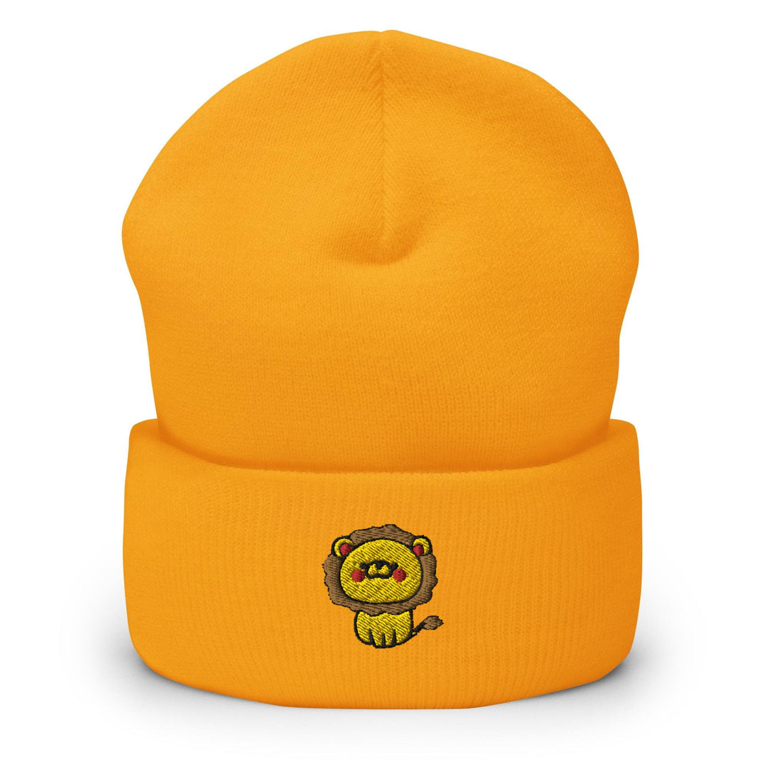 a yellow beanie hat with a lion embroidered on the front