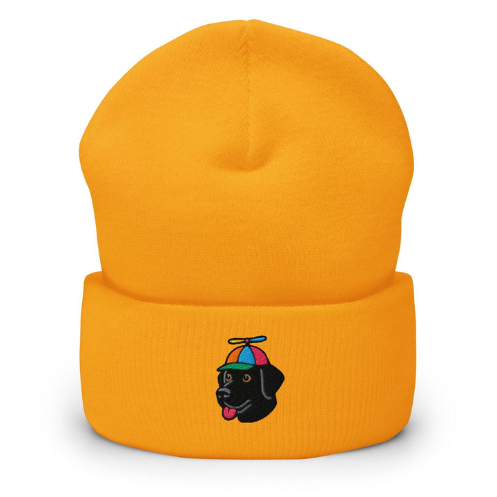 a yellow beanie with a black dog wearing a colorful hat