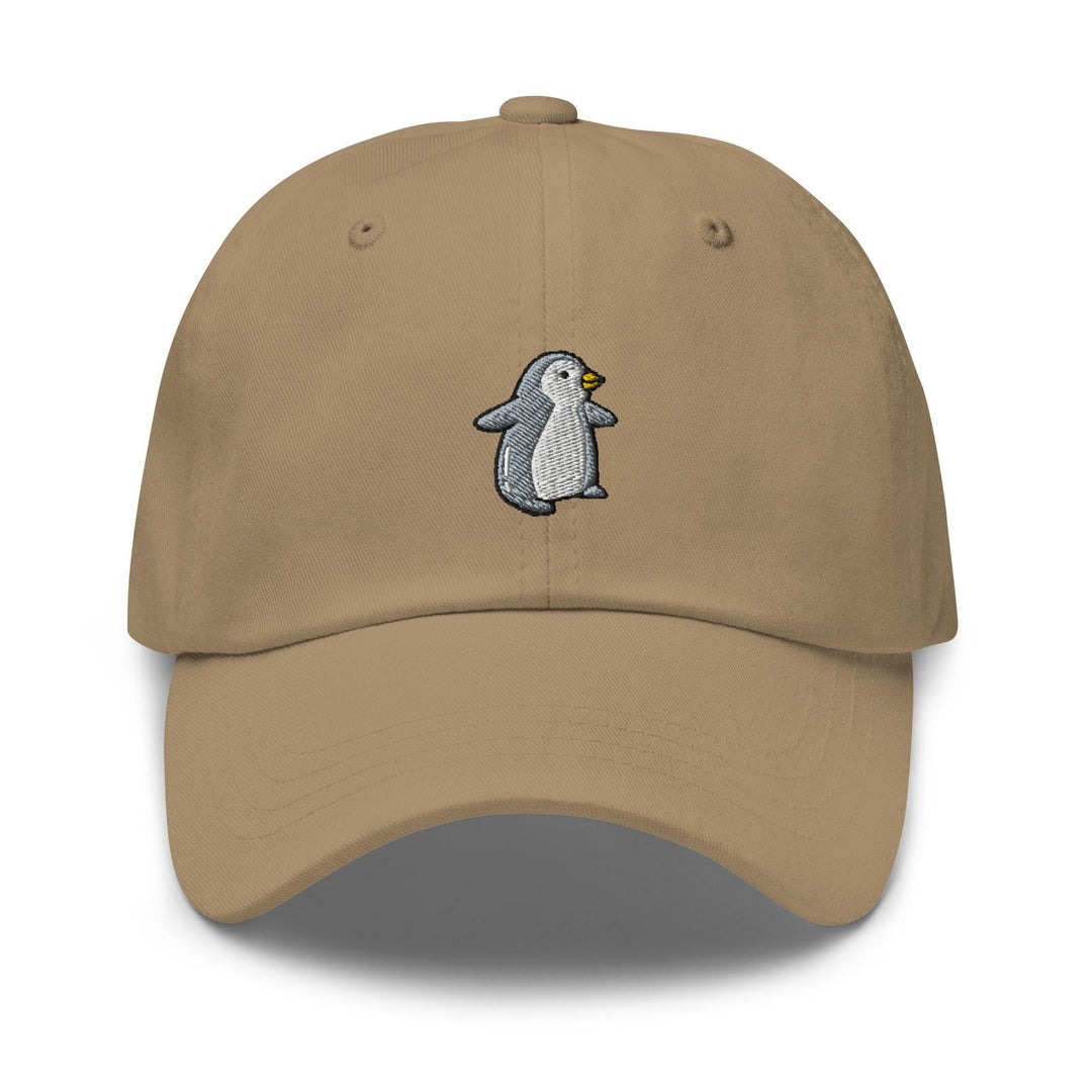 a tan hat with a penguin embroidered on it