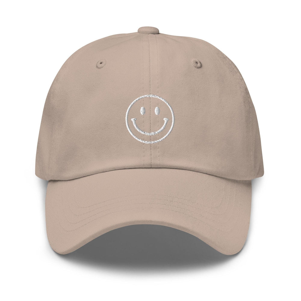 a tan hat with a smiley face drawn on it
