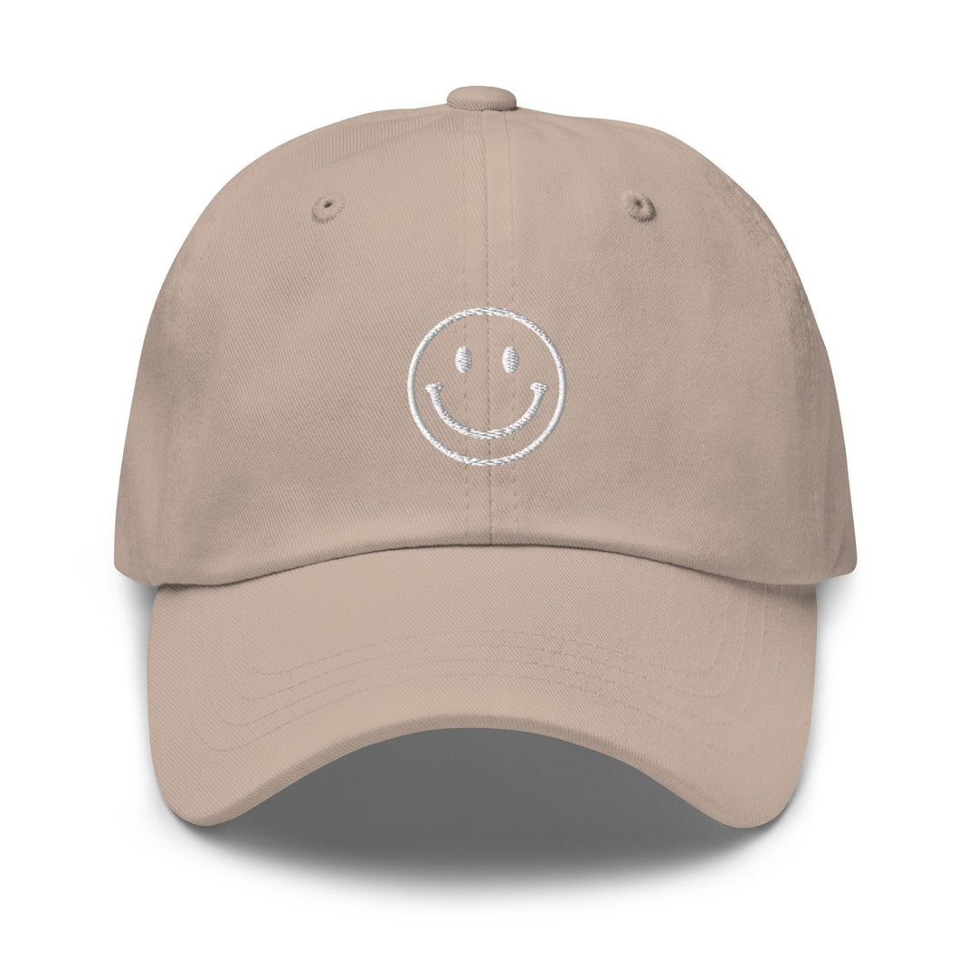 a tan hat with a smiley face drawn on it
