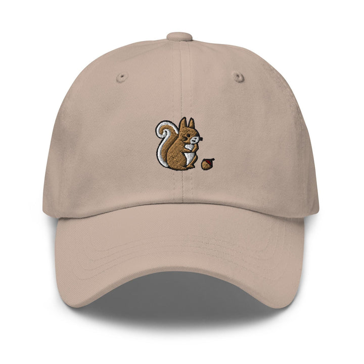 a cap with a squirrel eating an acorn