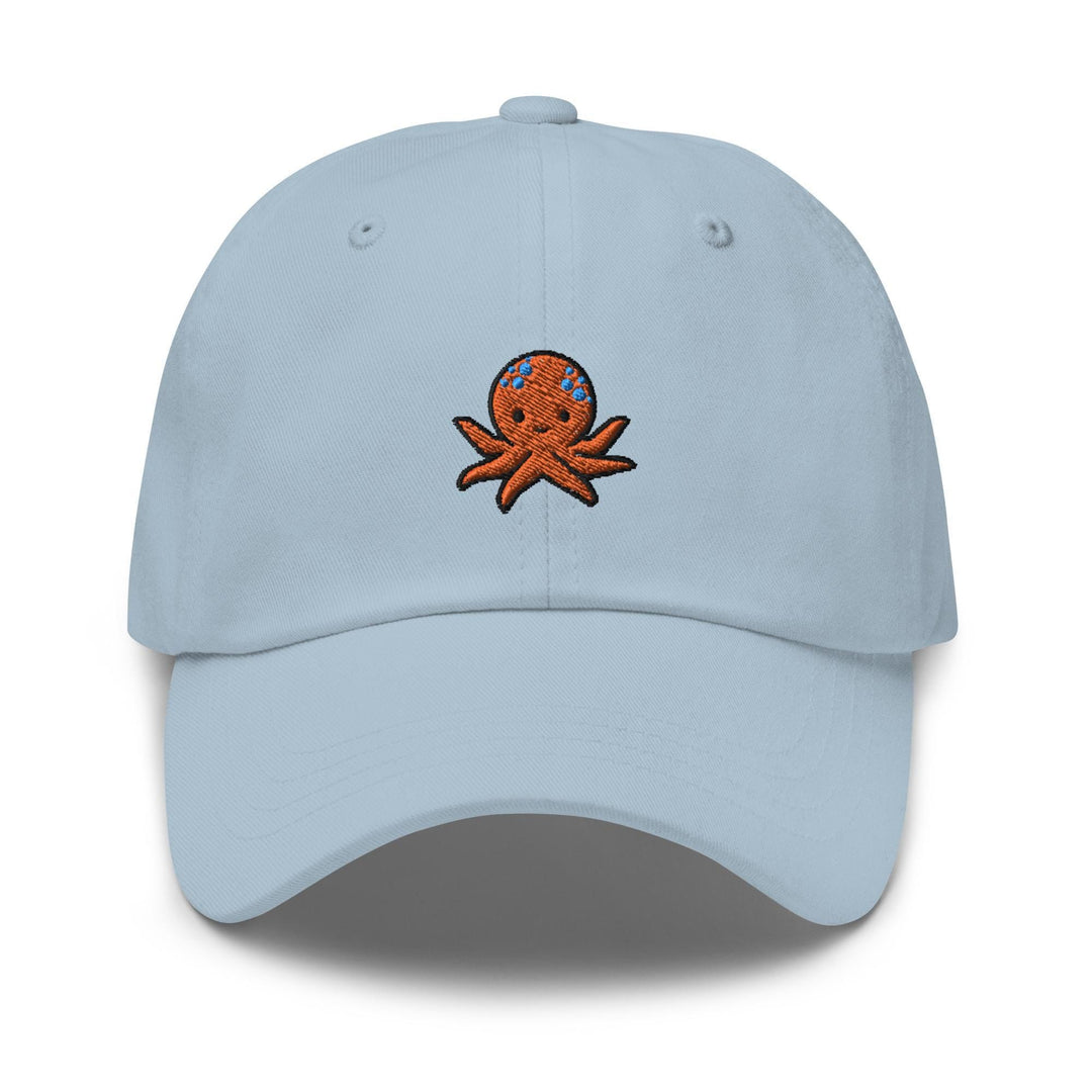 a light blue hat with an octopus embroidered on the front