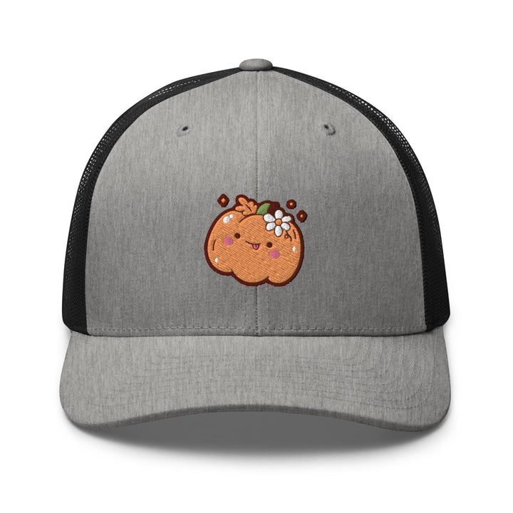 a gray and black trucker hat with a cartoon pumpkin on it