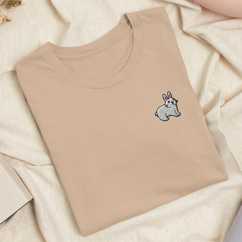 a t - shirt with a picture of a rabbit on it