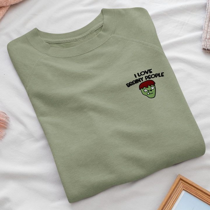 a green t - shirt that says i love broccoli