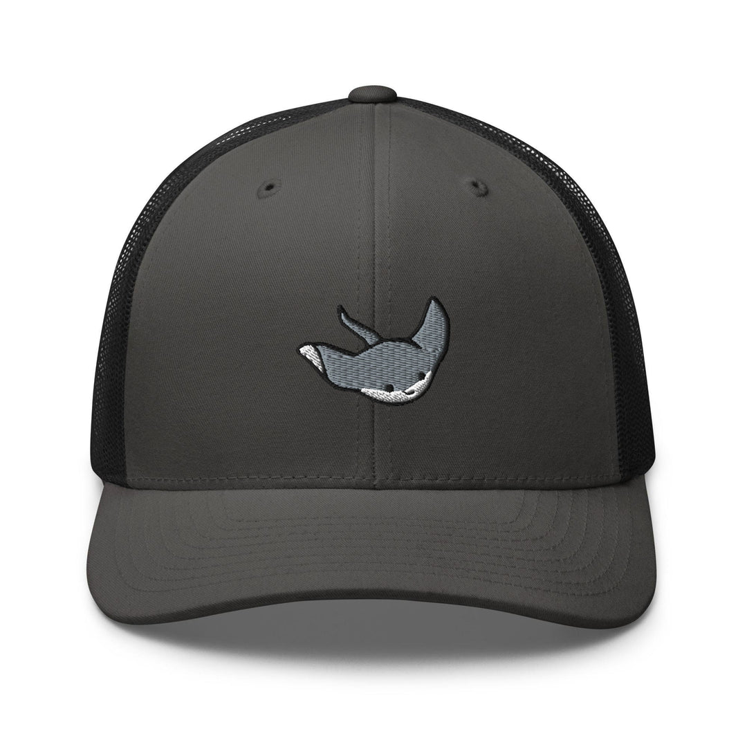 a gray and black trucker hat with a whale embroidered on the front