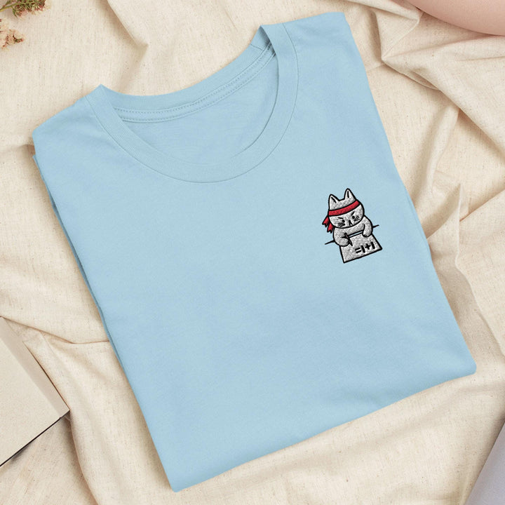 a t - shirt with a picture of a cat on it