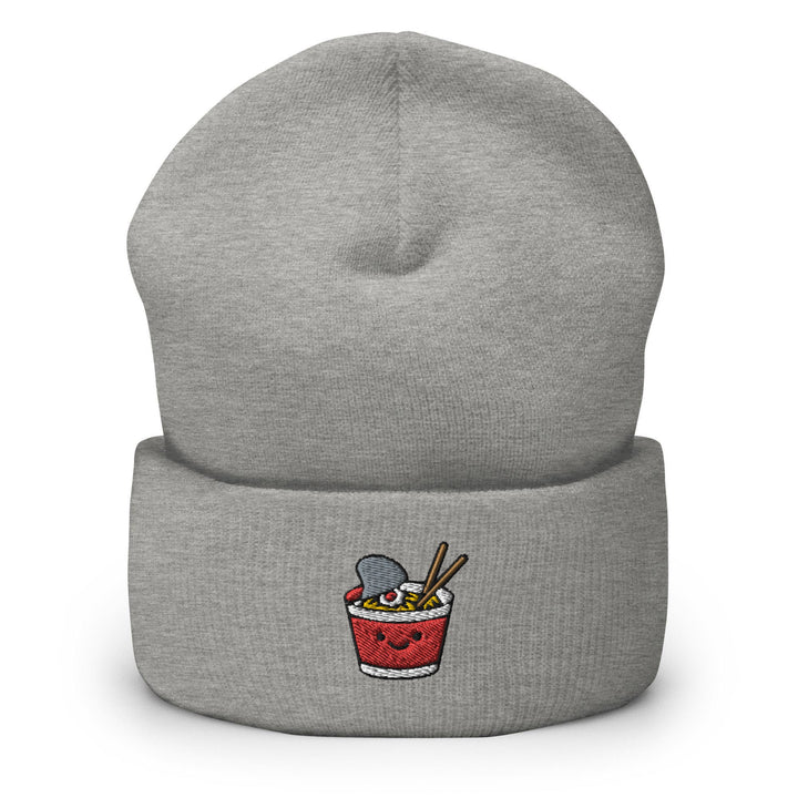 a gray beanie with a cartoon of a cup of cereal