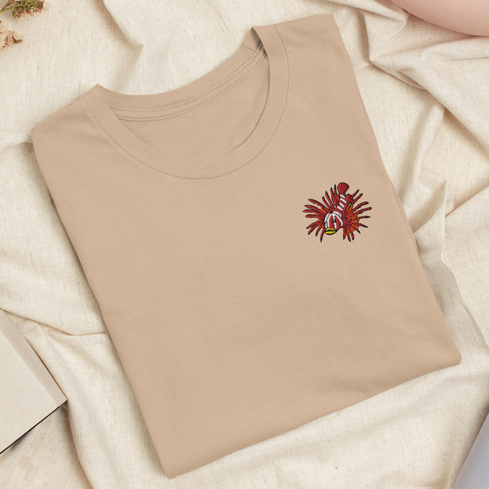 a t - shirt with a picture of a bird on it