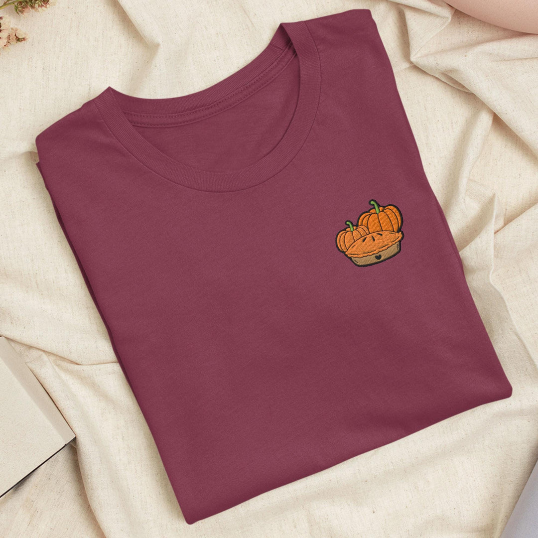 a t - shirt with a picture of a pumpkin on it