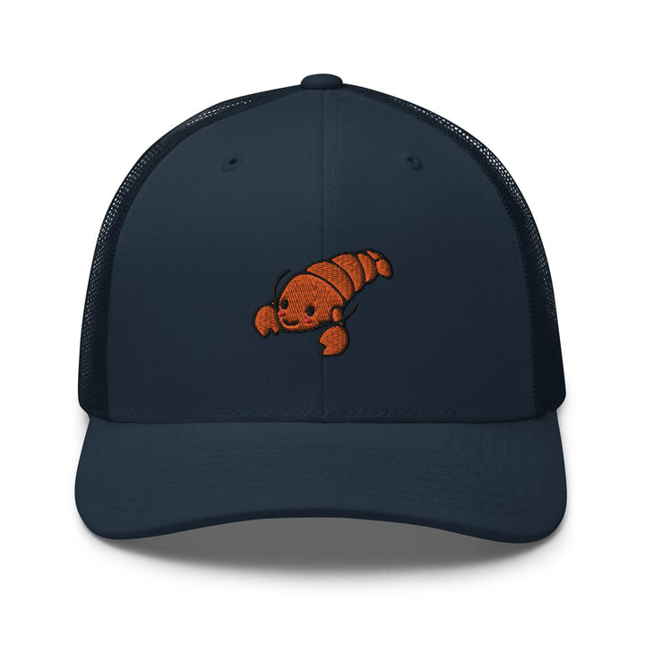 a blue trucker hat with an orange fish on it