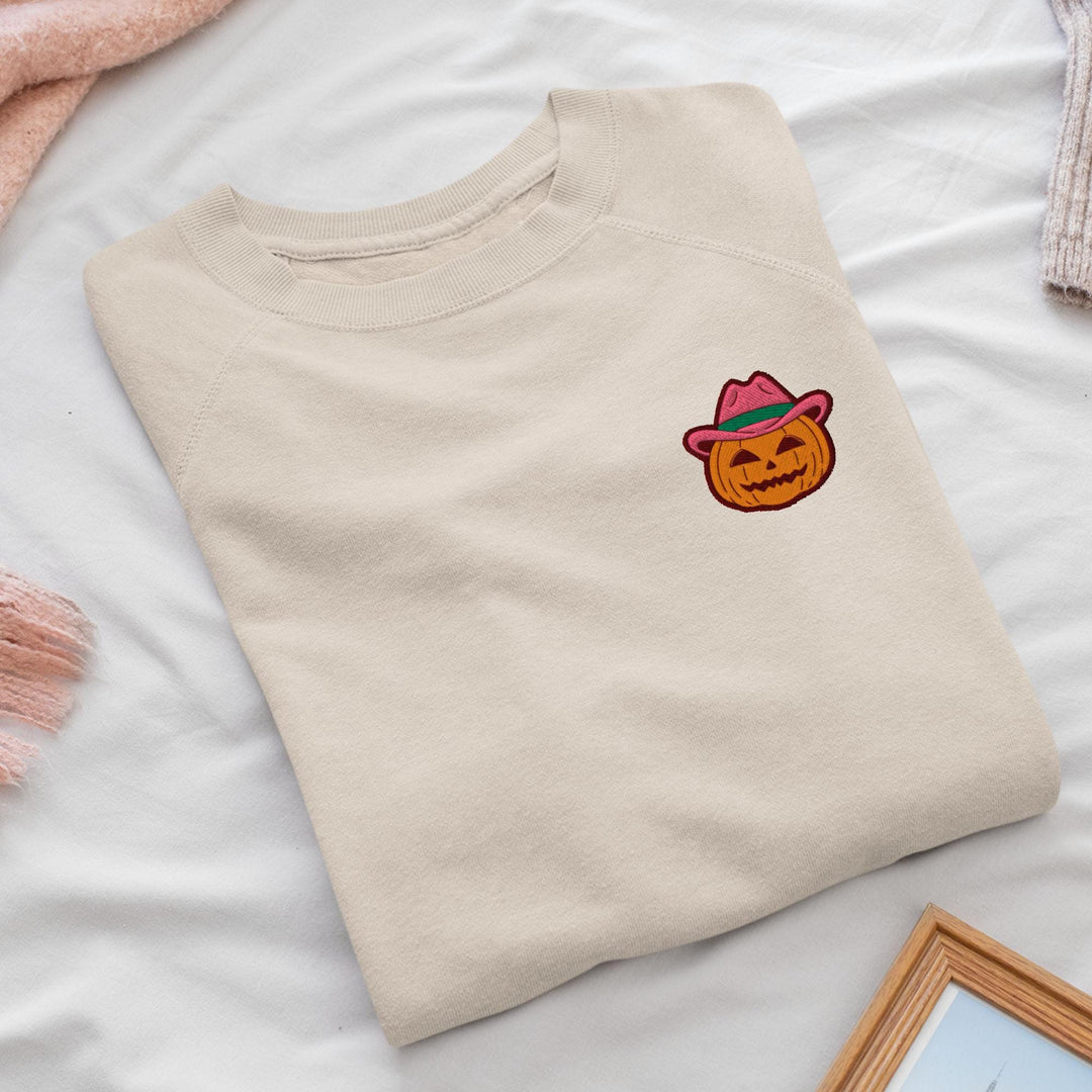a t - shirt with a picture of a pumpkin on it