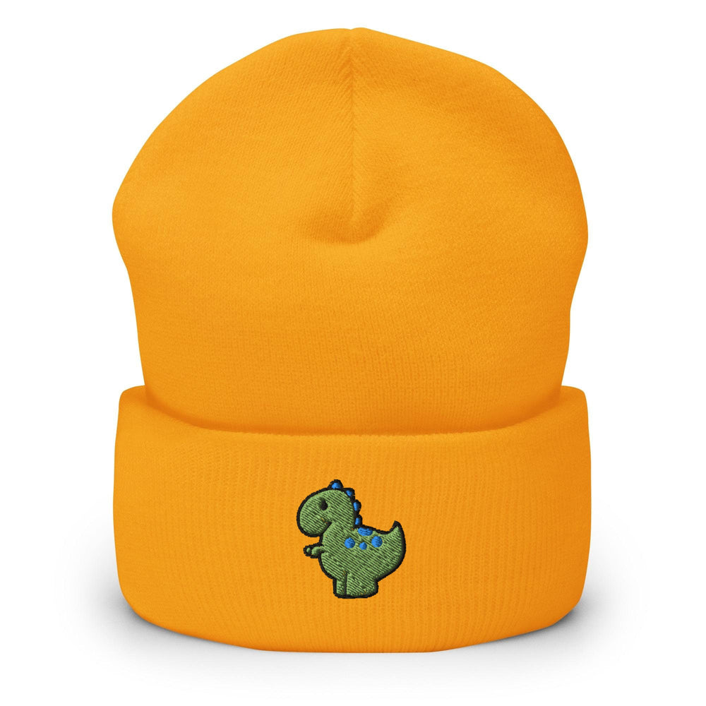 a yellow beanie with a green dinosaur embroidered on it