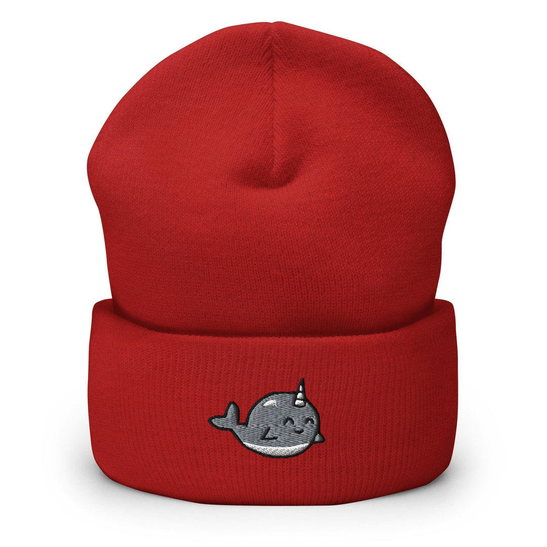 a red beanie with a grey whale embroidered on it