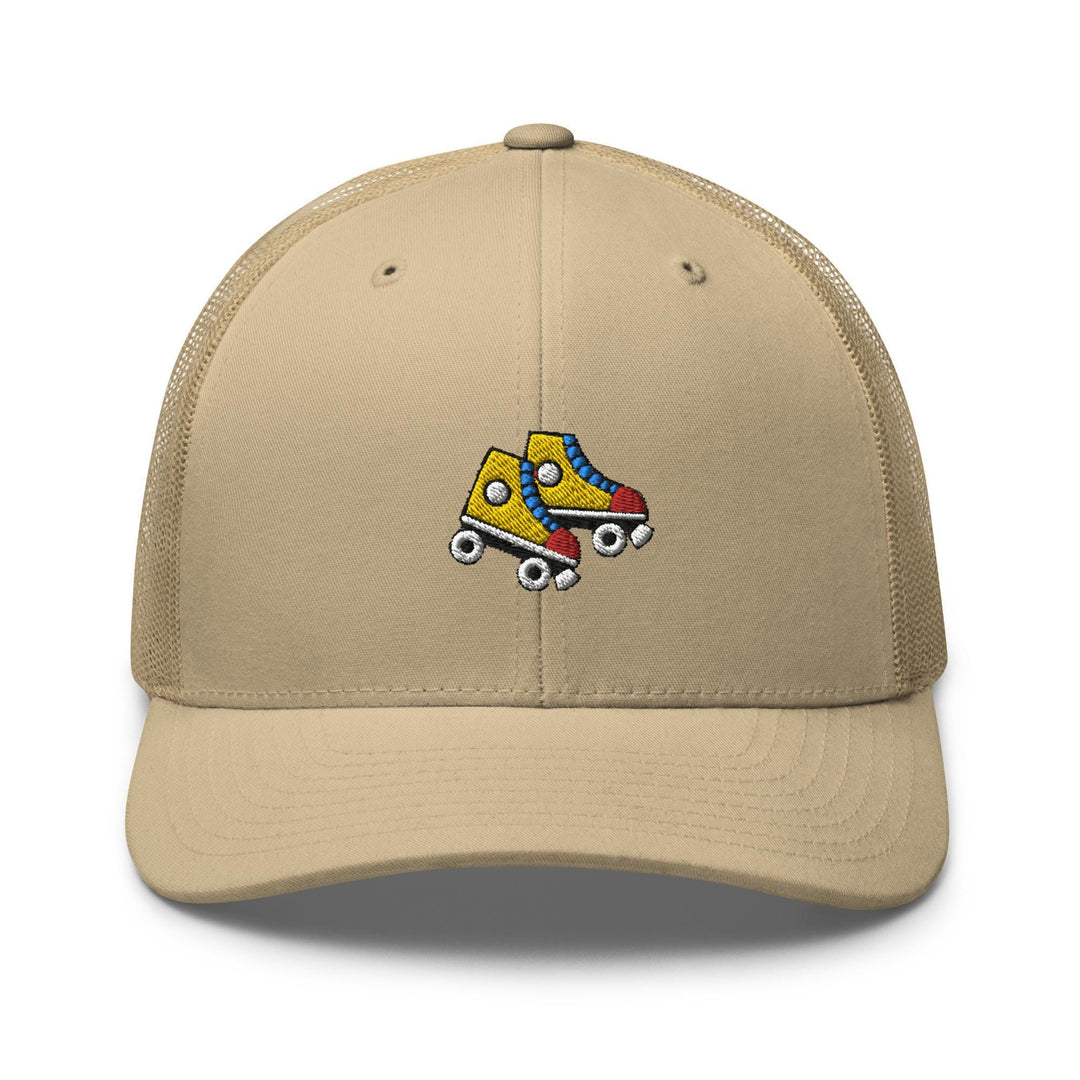a tan hat with a roller skate design on it