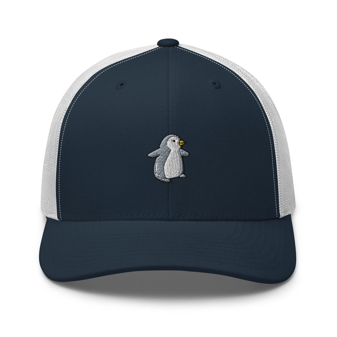 a blue and white trucker hat with a penguin embroidered on the front