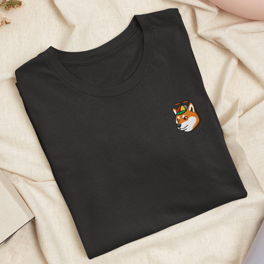 a black t - shirt with a fox embroidered on it