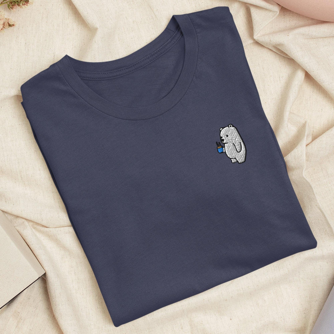a blue t - shirt with an elephant embroidered on it