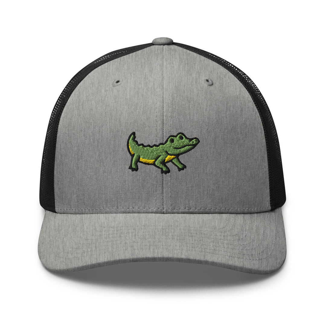 a gray and black hat with a green alligator on it