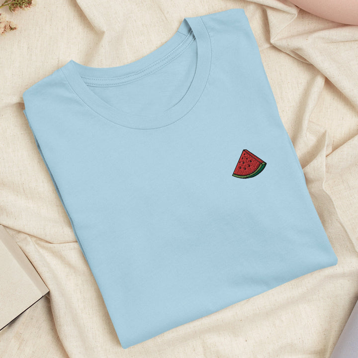 a blue t - shirt with a watermelon embroidered on it