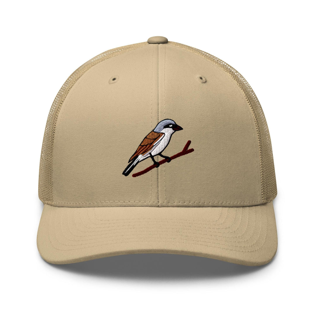 a tan hat with a bird on it