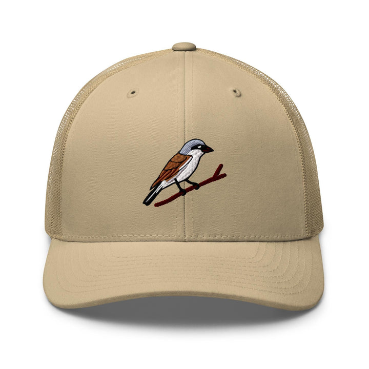 a tan hat with a bird on it
