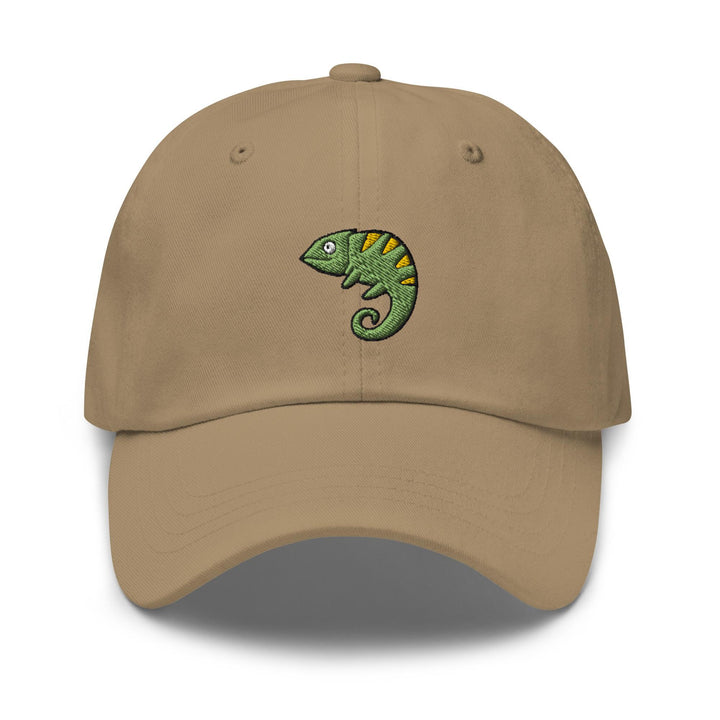 a tan hat with a green chamelon embroidered on it