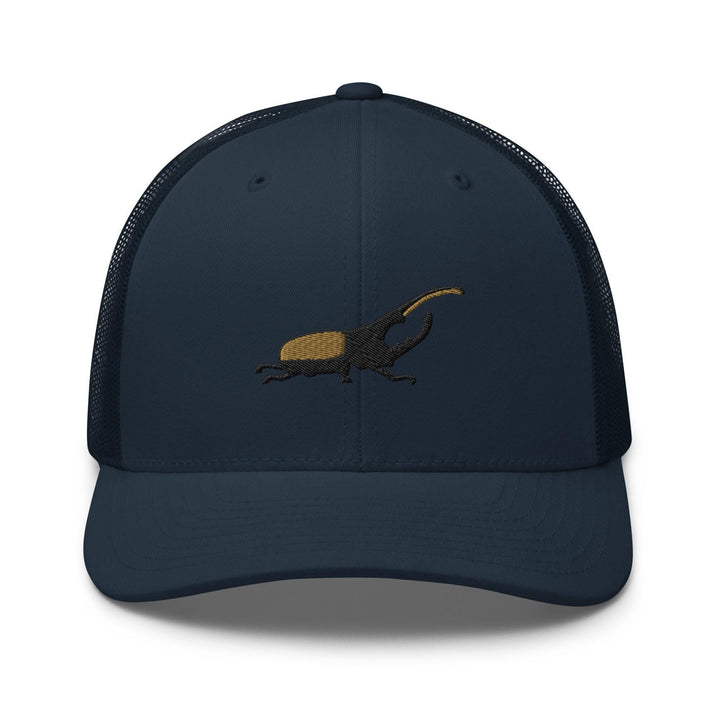 a blue hat with an image of a lizard on it