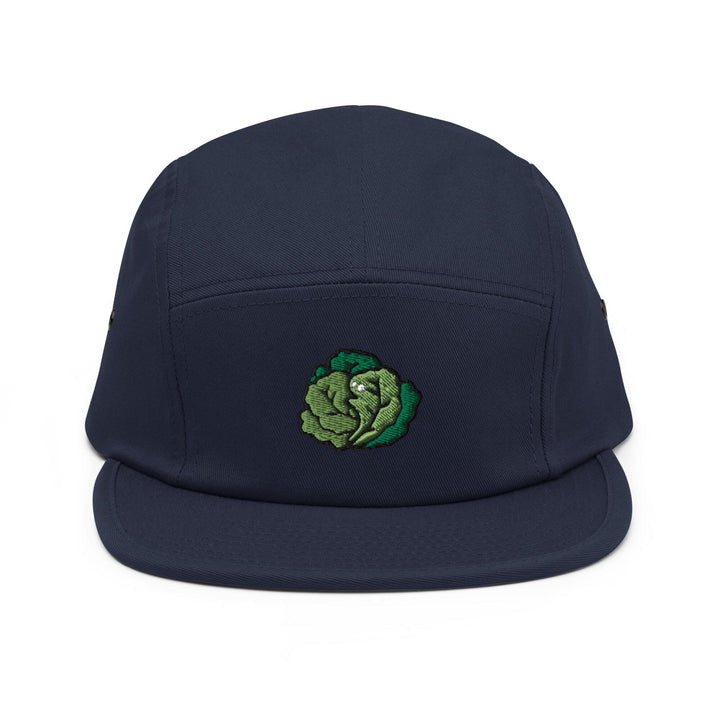 a blue hat with a green cabbage embroidered on it